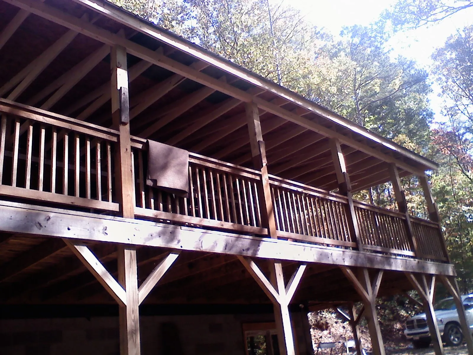 Timber framing under a new elevated porch and deck — Roof Leak Repair in Westphalia by Roofing Brothers